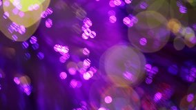 Multicolored lights with bokeh, defocused motion abstract background 