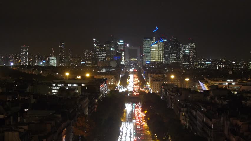 Paris, France - October, 2015 - Medium shot of La Défense at night viewed from the top of the Arc de Triomphe. Royalty-Free Stock Footage #13767233