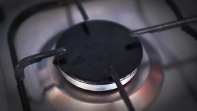 Close up video of the gas burner on a gas stove. 4k