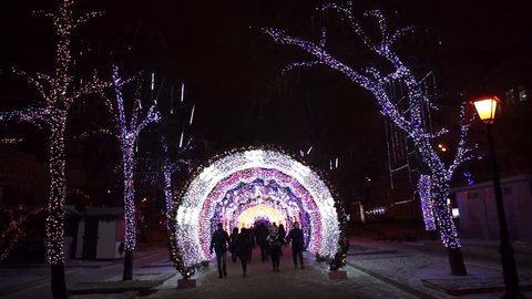 MOSCOW - DECEMBER 30: People walking in city center decorated for Christmas on December 30, 2015 in Moscow, Russia