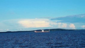 Sea Landscape with White Ship on the Blue Water, Stabilized Full HD Shot from other Ship