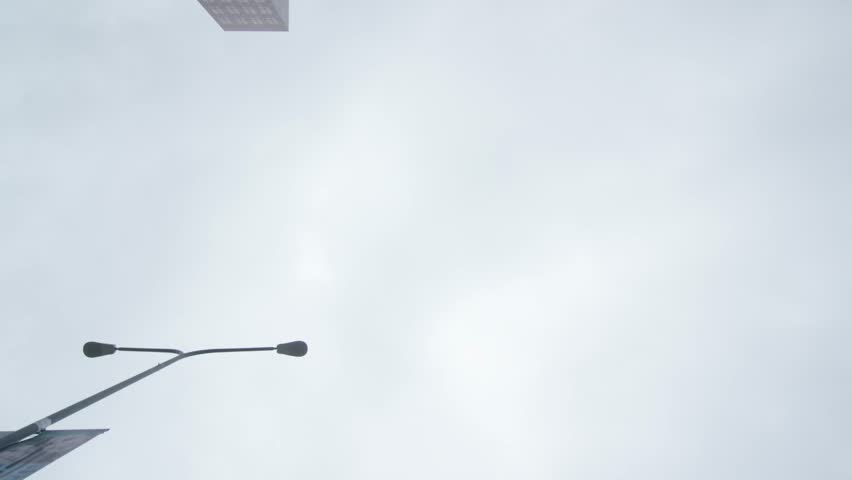 Miracle Mile: Los Angeles, CA USA Set 5 - Driving Plate Reflection Plate angle: Car travels W on Wilshire Blvd on a cloudy day in light traffic. Shot on RED Dragon.