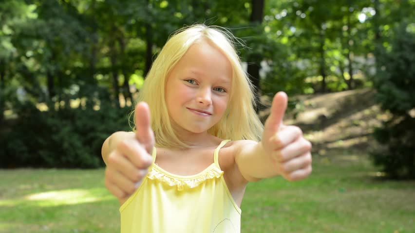 Little Happy Girl Shows Thumbs Stock Footage Video 100 Royalty Free Shutterstock