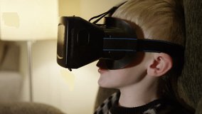 Child using virtual reality headset - the future of entertainment and immersive story telling