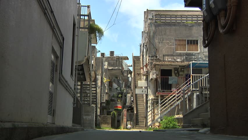 Small street and concrete buildings in rural Japan.