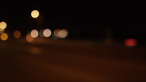 Freeway: Santa Clarita, CA USA Set 7 - Driving Plate Left Rear three quarters View angle: Car travels S on I-5 on a clear evening in light traffic. Medium bokeh. Shot on RED Dragon.
