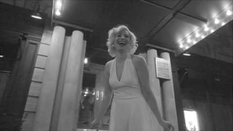 sped-up Marilyn Monroe in black and white in front of hotel laughing from The Seven Year Itch in 1080p HD