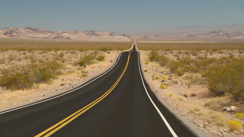 Driving shot on an empty road in Death Valley National Park | Shutterstock HD Video #1386931