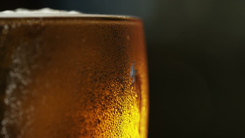 Overflowing Beer in a Glass