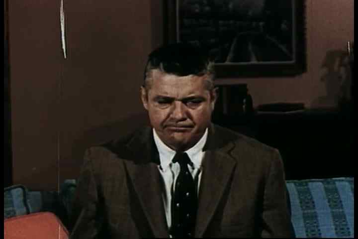 CIRCA 1950s - A man gives a presentation to his colleagues at the office in 1959.