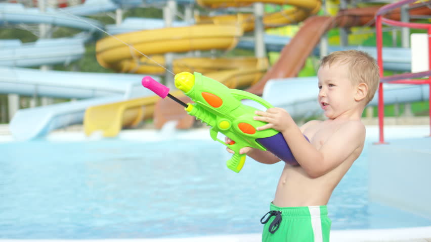 kid with water gun