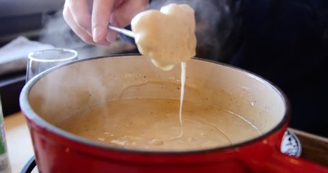 A traditional Swiss food: the fondue cheese.