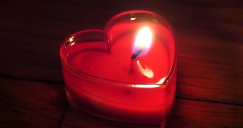 4k Candles burning in the night,heart shape,Merry Christmas And Happy New Year. gh2_11218_4k