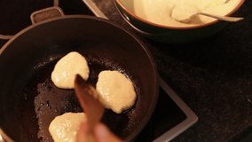 Cooking-manual footage: fritters being fried in the pan