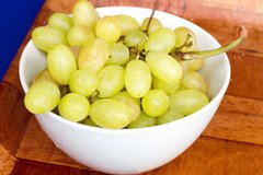 Eating fresh delicious grapes, fast motion time lapse, full high definition video (1080i)