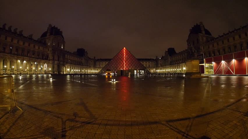 Paris, France - October, 2015 - Wide shot of the Pryamide du Louvre at night.