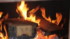 the wood burning in the brazier for barbecue