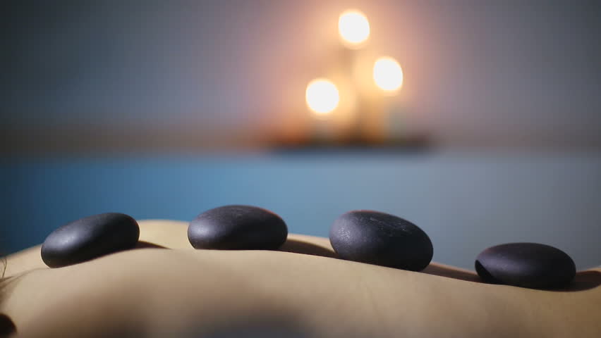 Woman Getting Hot Stone Massage Spa Stock Footage Video 100 Royalty Free 13942244 Shutterstock