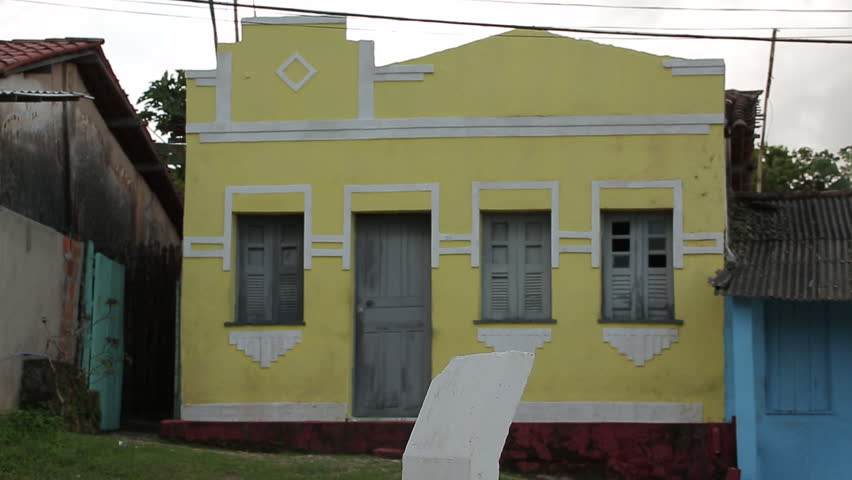 View of a old yellow house in Sao Bras, Bahia, Brazil