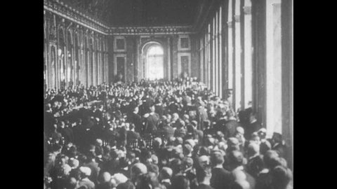 FRANCE 1919: Men Sign Treaty at the Versailles Peace Conference