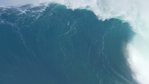 MAUI, HAWAII.  January, 15 2016: Big Wave Surfing Wipeout. Surfer Crashes on Giant Ocean Wave Surfing Jaws on North Shore in Hawaii.