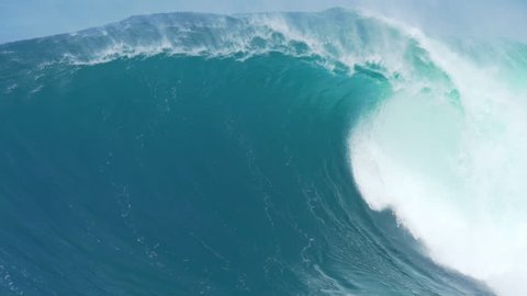 Giant Ocean Wave Breaking in Hawaii. Slow Motion HD. Surfing Jaws