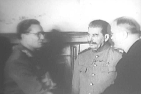 CIRCA 1960s - Josef Stalin and Josip Tito of Yugoslavia sign a treaty in 1946 of mutual interest and friendship, an American documentary on Communist Imperialism in 1961.
