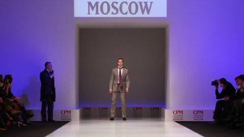 MOSCOW - FEBRUARY 22: Man wears gray suit from Slava Zaytzev and walks the catwalk in the Collection Premiere Moscow, on February 22, 2011 in Moscow, Russia.  Editorial Stock Video