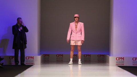 MOSCOW - FEBRUARY 22: Man wears pink summer suit from Slava Zaytzev and walks the catwalk in the Collection Premiere Moscow,, on February 22, 2011 in Moscow, Russia. Editorial Stock Video