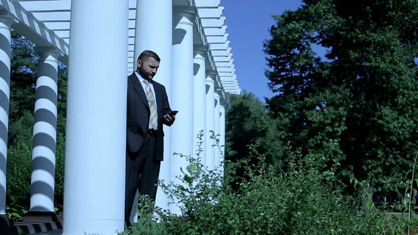 Businessman work in a park 
