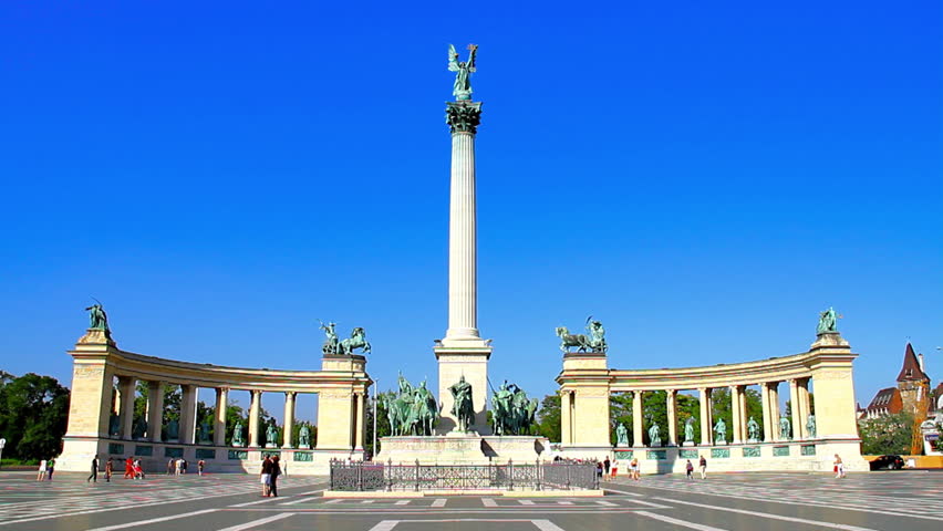 Heroes Square in Budapest - Hungary Budapest Hungary - Heroes Square June 2010 Wide shot with people walking on the square.