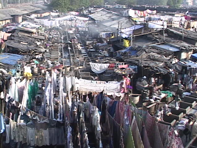 People wash cloths at the dhobi gnats, open air laundries, in Bombay India.