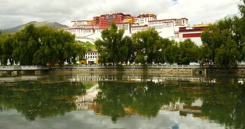 4k Potala reflection on lake in Lhasa park,Tibet.lake with willow. gh2_09749_4k