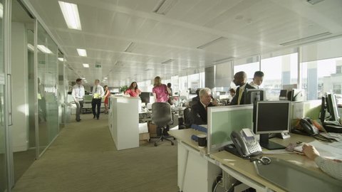 4k / Ultra HD version Diverse business group working together in large modern city office. In slow motion. Shot on RED Epic