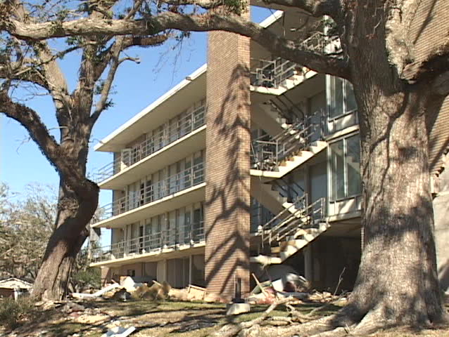 A damaged apartment building shows the destruction caused by Hurricane Katrina.