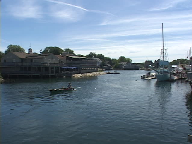 Pedestrians stroll across the bridge to Kennebunkport, Maine.