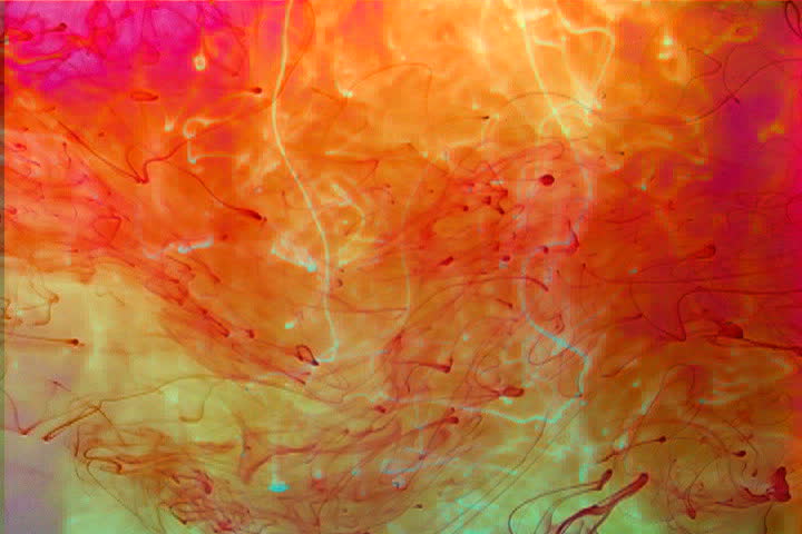 A tapestry of color intermingles in a fluid environment.