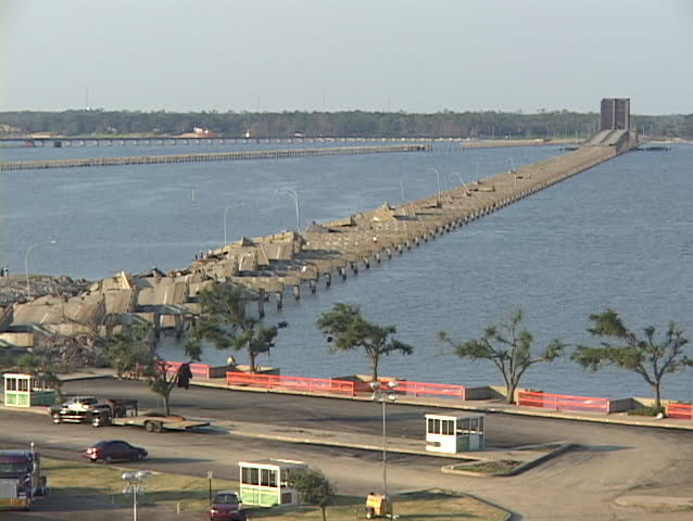 Water flows around a destroyed causeway along the Gulf Coast of Mississippi following Hurricane Katrina.
