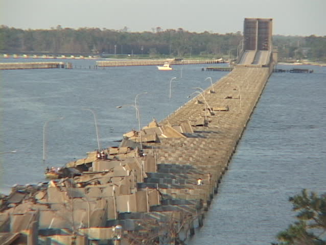 People work on a destroyed causeway along the Gulf Coast of Mississippi, following Hurricane Katrina.