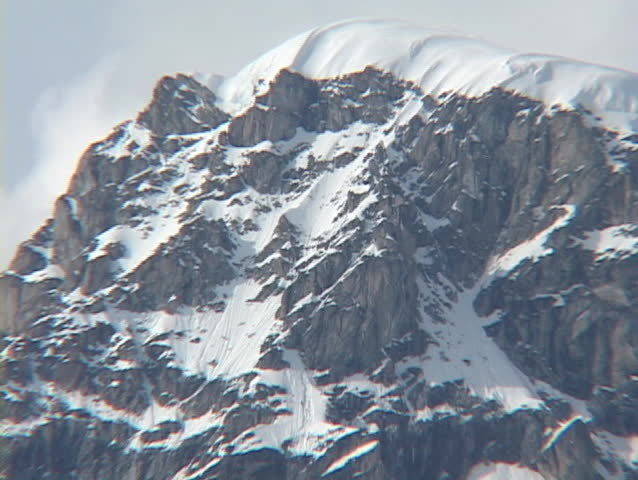 Aerial POV shot flying over an Alaskan glacier field.