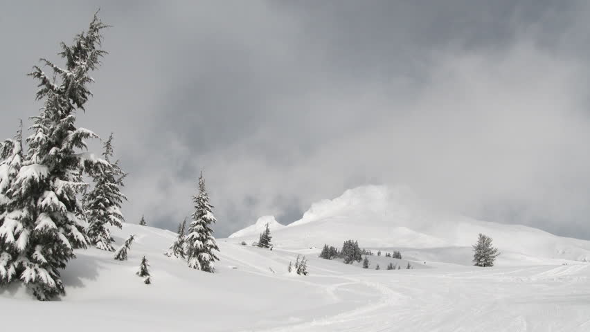 Mystical day on Mt Hood at Timberline with weather system moving over peak after fresh snowfall in Oregon, time lapse.