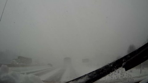 Ontario, Canada January 2016 POV dashcam driving in snowstorm and snow covered highway in blizzard

