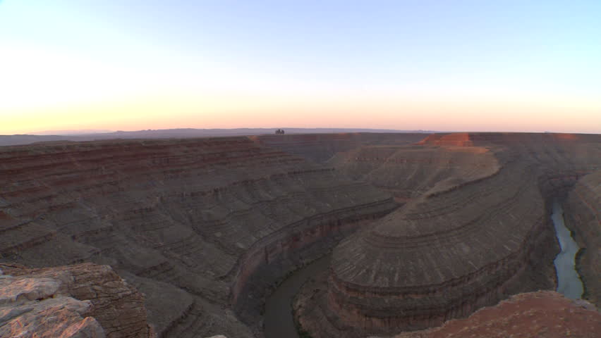 camera pans across the canyons carved by the San Juan River