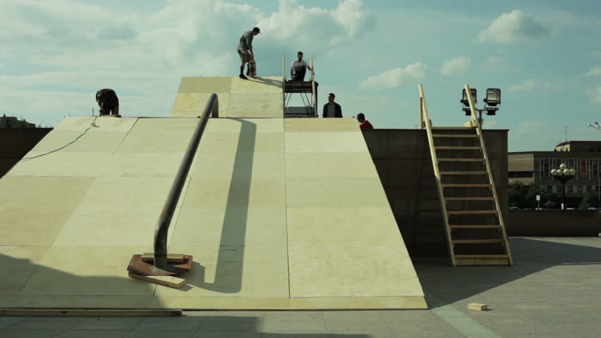 skater rolls off the ramp