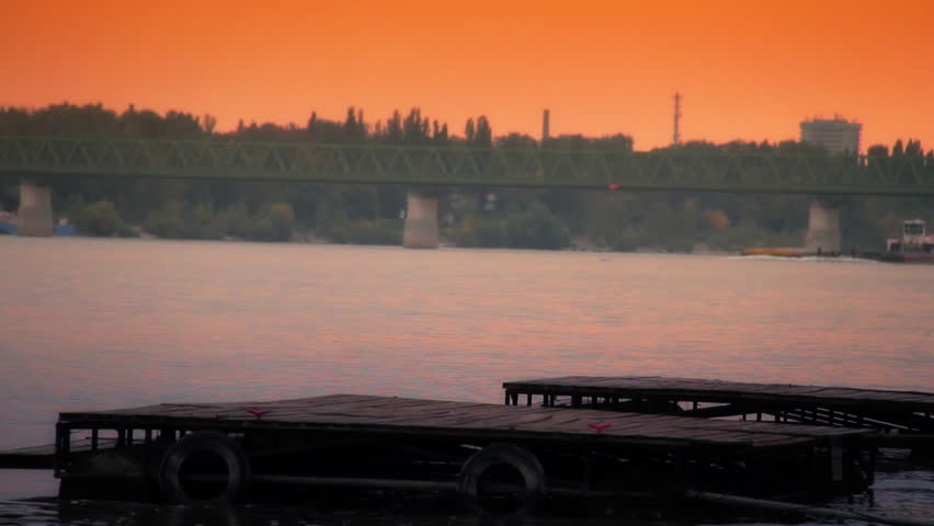 Kayaker on a river at an autumn scene.Artcolored.