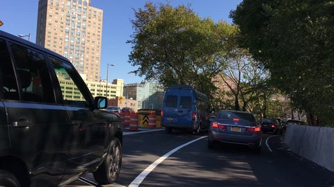 NEW YORK CITY - OCTOBER 2015: Car Traffic Exiting Brooklyn Bridge