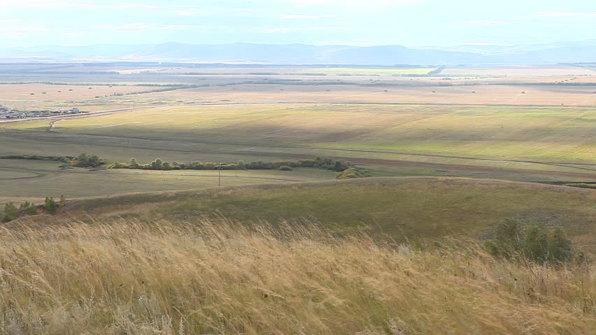 shadows of clouds in the autumn field