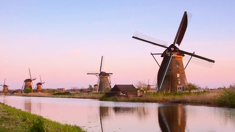 The picturesque landscape with aerial mill on the channel in Kinderdiyk, Netherlands. Full HD video (High Definition).