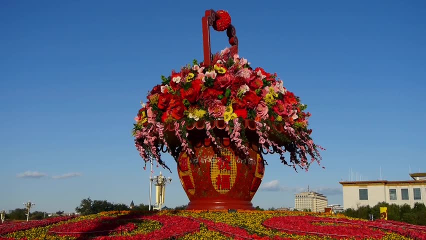 gorgeous baskets full of flowers in blue sky.Beijing Tiananmen Square sunny. gh2_04311