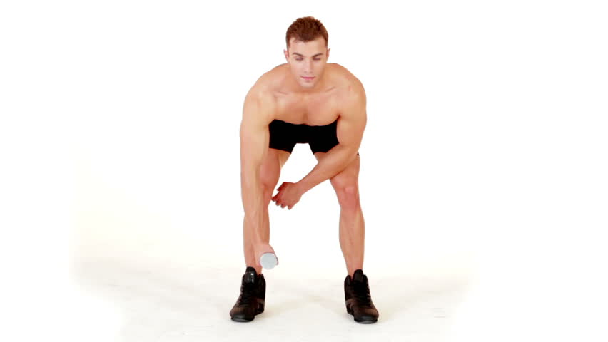 Muscular man exercising with dumbbells on isolated white background